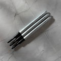 Three nail art brushes from 'The Nail Lab' on a textured gray surface